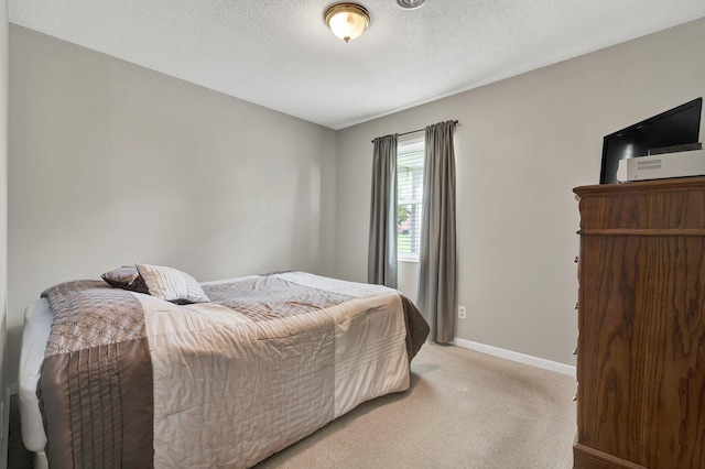971 Hamilton Cir NW, Cleveland, TN 37312 - bedroom with light carpet, baseboards, and a textured ceiling