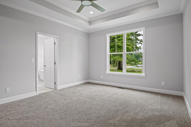 338 Kerry Ln, Soddy Daisy, TN 37379 - carpeted spare room featuring a raised ceiling, ornamental molding, ceiling fan, baseboards, and recessed lighting