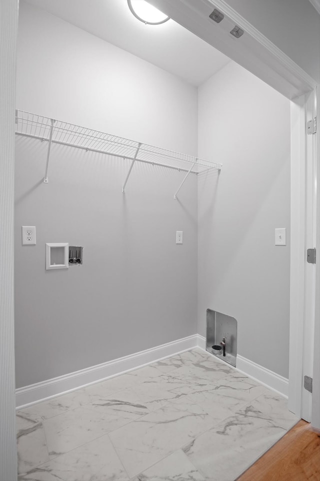 338 Kerry Ln, Soddy Daisy, TN 37379 - washroom with marble finish floors, baseboards, and washer hookup