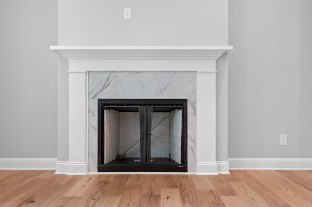338 Kerry Ln, Soddy Daisy, TN 37379 - detailed view of a high end fireplace, wood finished floors, and baseboards