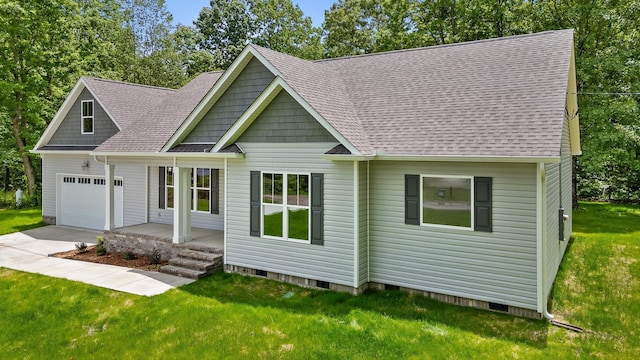 338 Kerry Ln, Soddy Daisy, TN 37379 - view of front of property featuring a garage, a front lawn, and a shingled roof