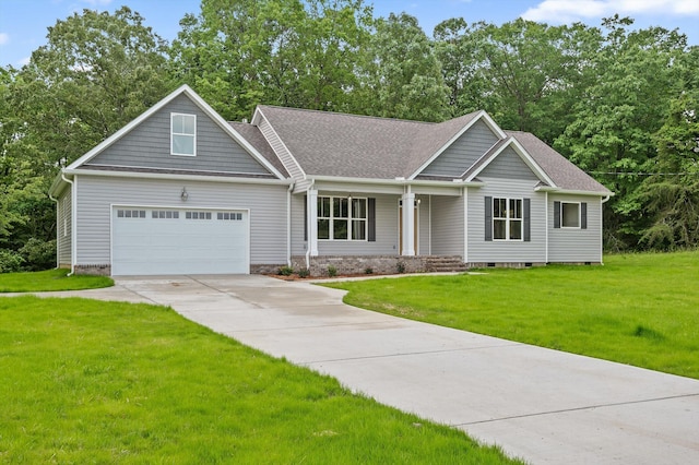 338 Kerry Ln, Soddy Daisy, TN 37379 - view of front of property featuring concrete driveway, a front lawn, a porch, and a shingled roof
