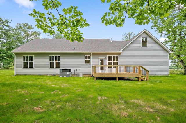338 Kerry Ln, Soddy Daisy, TN 37379 - back of property with a deck, central AC unit, a lawn, and roof with shingles