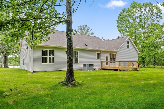338 Kerry Ln, Soddy Daisy, TN 37379 - back of property with a deck, a yard, roof with shingles, and cooling unit