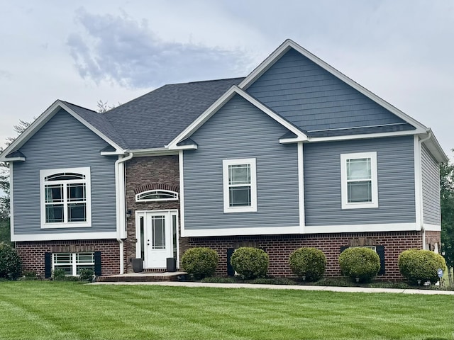 438 Ginger Lake Dr, Rock Spring, GA 30739 - raised ranch featuring a front yard and brick siding