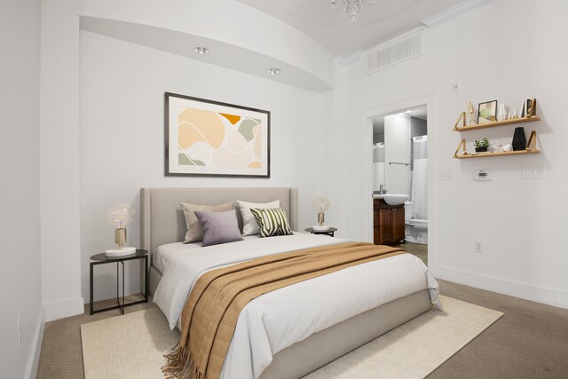 129 Walnut St Unit 212, Chattanooga, TN 37403 - bedroom featuring carpet flooring, baseboards, and ensuite bathroom