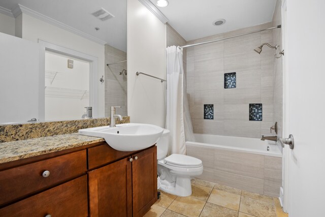 129 Walnut St Unit 212, Chattanooga, TN 37403 - bathroom with tiled shower / bath combo, vanity, toilet, crown molding, and tile patterned flooring