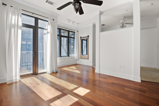 129 Walnut St Unit 212, Chattanooga, TN 37403 - unfurnished room featuring ceiling fan, ornamental molding, baseboards, rail lighting, and wood finished floors