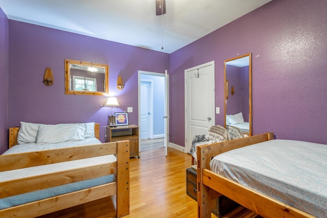 375 Cody Way, Tunnel Hill, GA 30755 - bedroom featuring light wood-style floors, a ceiling fan, and baseboards