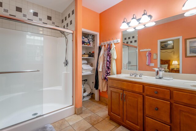 375 Cody Way, Tunnel Hill, GA 30755 - full bathroom featuring a shower stall, tile patterned floors, and double vanity