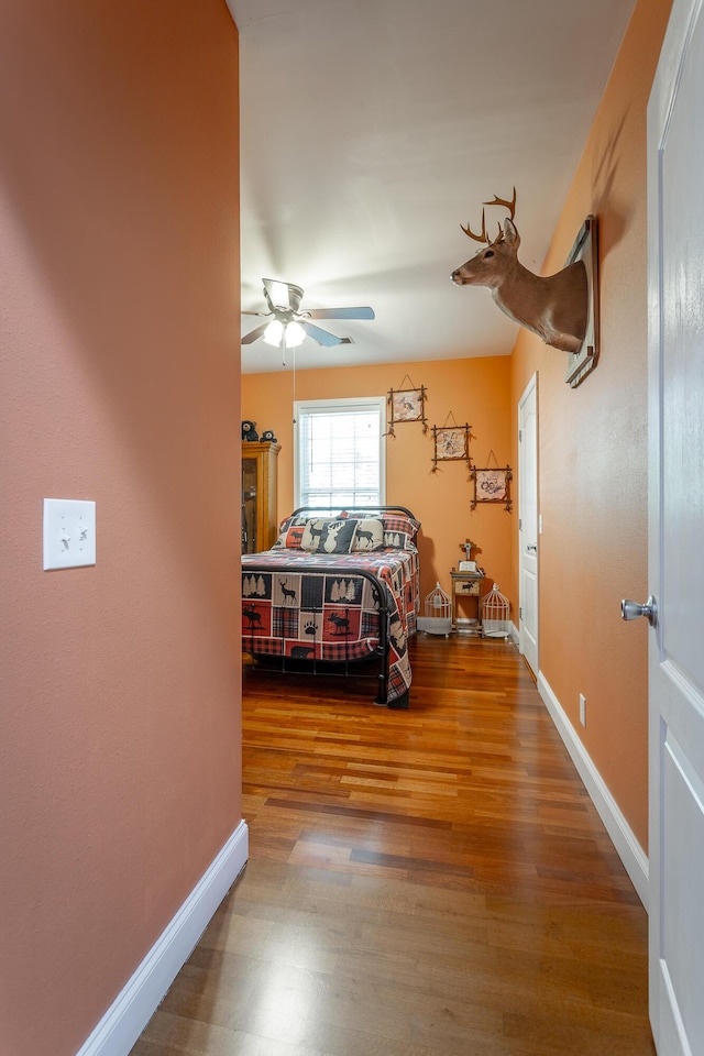 375 Cody Way, Tunnel Hill, GA 30755 - bedroom with wood finished floors, baseboards, and a ceiling fan