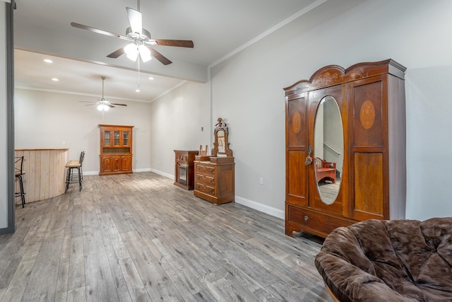 375 Cody Way, Tunnel Hill, GA 30755 - living area featuring a ceiling fan, crown molding, wood finished floors, baseboards, and recessed lighting
