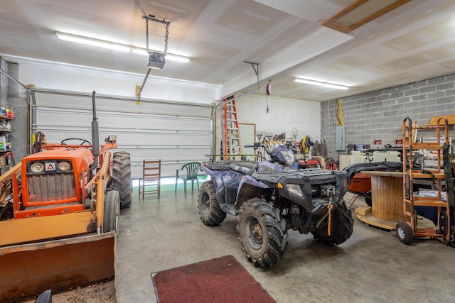 375 Cody Way, Tunnel Hill, GA 30755 - garage with concrete block wall and a garage door opener
