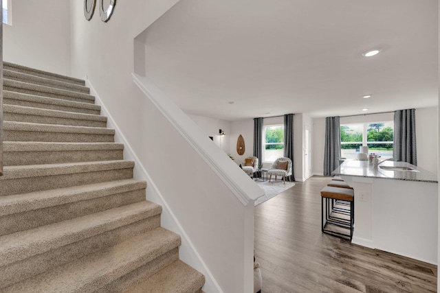 304 Draft St, Rossville, GA 30741 - staircase featuring wood finished floors and recessed lighting