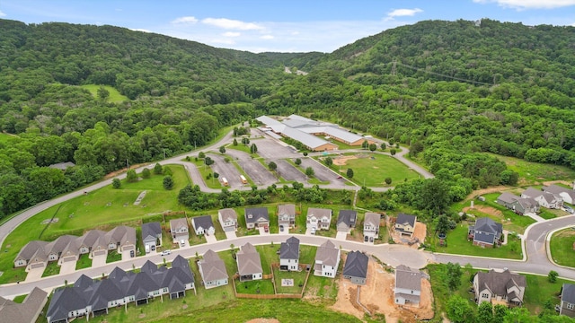7559 Snow Cone Way, Ooltewah, TN 37363 - aerial perspective of suburban area with a heavily wooded area