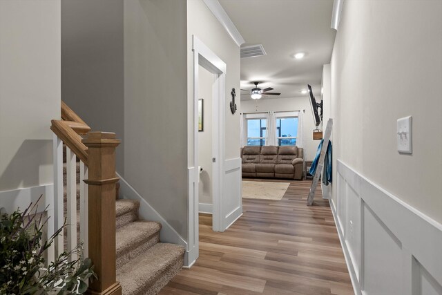 7559 Snow Cone Way, Ooltewah, TN 37363 - corridor with light wood finished floors and stairway