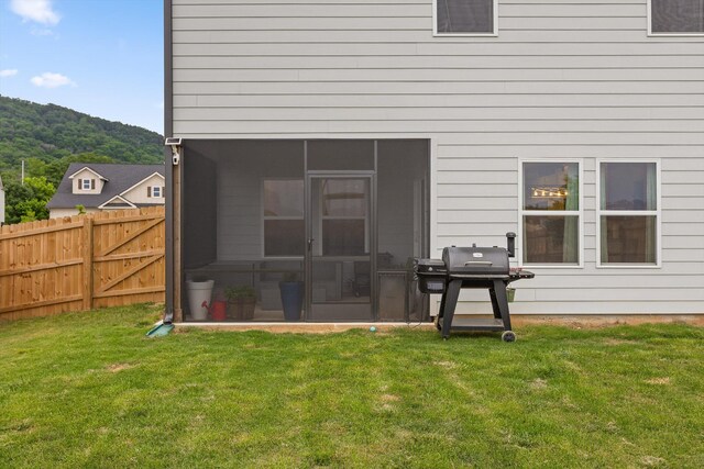 7559 Snow Cone Way, Ooltewah, TN 37363 - back of house featuring a sunroom and a mountain view
