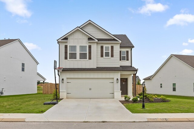 7559 Snow Cone Way, Ooltewah, TN 37363 - craftsman-style home featuring board and batten siding, concrete driveway, an attached garage, and a shingled roof