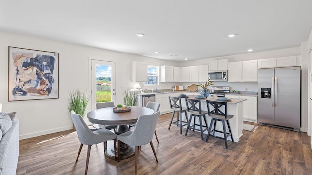 314 Draft St, Rossville, GA 30741 - dining space featuring recessed lighting, dark wood-style flooring, and baseboards