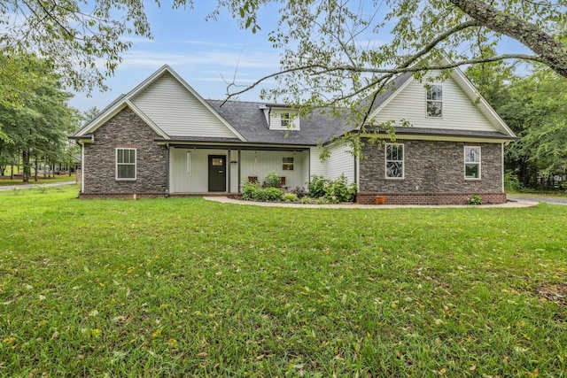 8012 Mcdonald Cemetery Rd, Ooltewah, TN 37363 - view of front of home with a front yard and a shingled roof