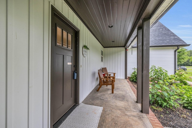 8012 Mcdonald Cemetery Rd, Ooltewah, TN 37363 - doorway to property featuring a porch and roof with shingles