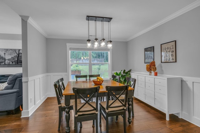 8012 Mcdonald Cemetery Rd, Ooltewah, TN 37363 - dining area featuring ornamental molding, dark wood-type flooring, and a wainscoted wall