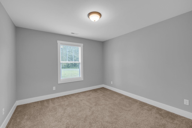 8012 Mcdonald Cemetery Rd, Ooltewah, TN 37363 - spare room featuring carpet and baseboards