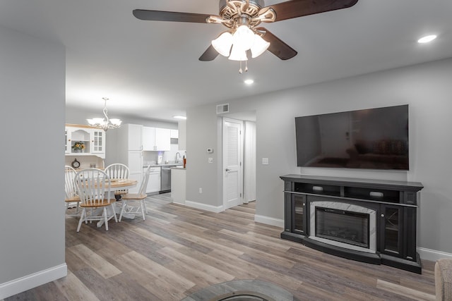 900 Mountain Creek Rd Unit 300, Chattanooga, TN 37405 - living area with ceiling fan, light wood-type flooring, baseboards, a chandelier, and recessed lighting