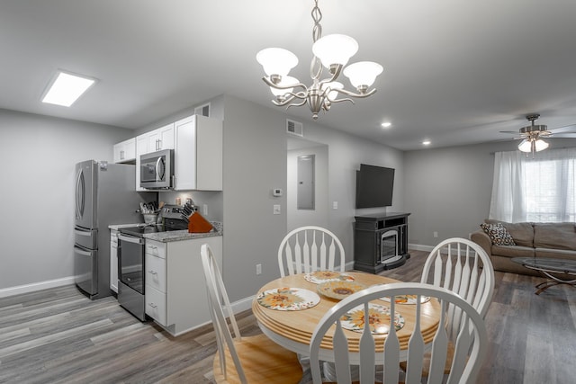 900 Mountain Creek Rd Unit 300, Chattanooga, TN 37405 - dining area with light wood finished floors, baseboards, a chandelier, electric panel, and recessed lighting