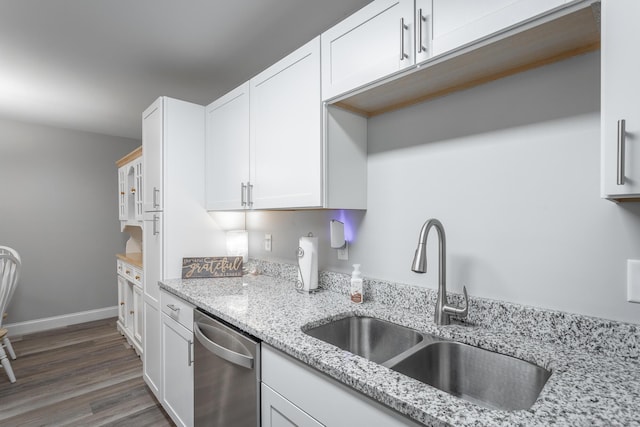 900 Mountain Creek Rd Unit 300, Chattanooga, TN 37405 - kitchen with dishwasher, a sink, white cabinets, light stone countertops, and wood finished floors
