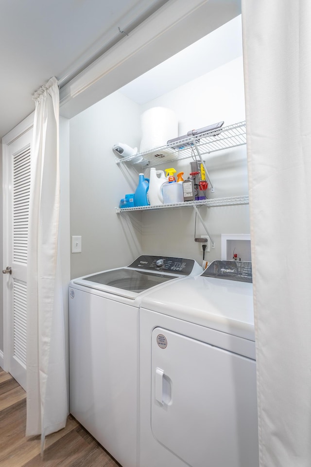 900 Mountain Creek Rd Unit 300, Chattanooga, TN 37405 - laundry area with washer and dryer and light wood-style floors