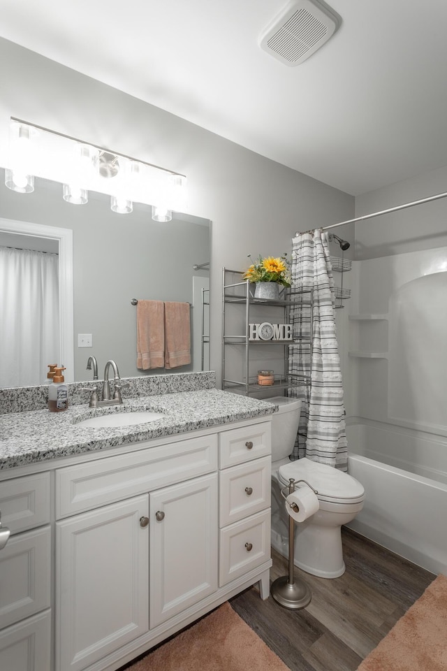 900 Mountain Creek Rd Unit 300, Chattanooga, TN 37405 - bathroom with wood finished floors, toilet, vanity, and shower / bathtub combination with curtain