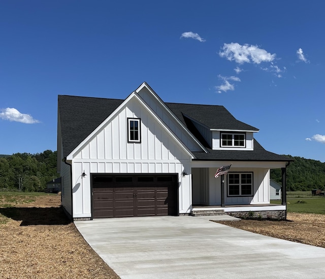 4958 Old State Highway 28, Dunlap, TN 37327 - modern farmhouse featuring driveway, a porch, board and batten siding, and a shingled roof
