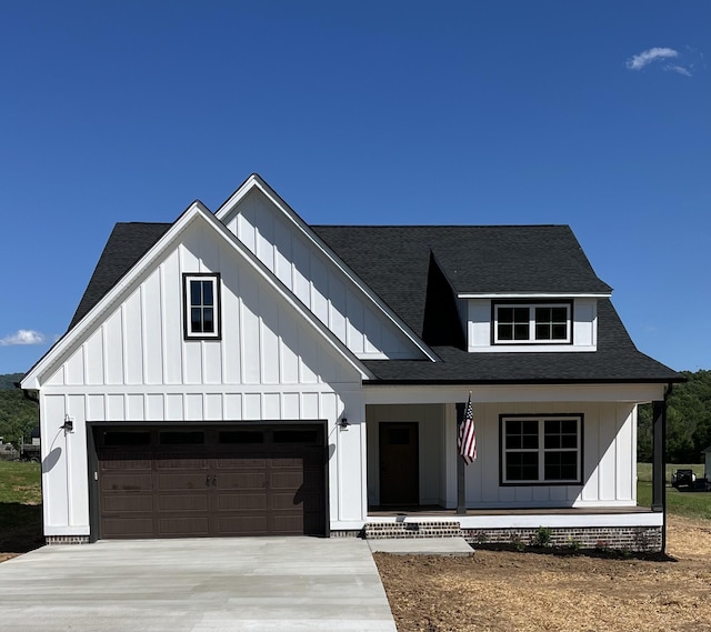 4958 Old State Highway 28, Dunlap, TN 37327 - modern inspired farmhouse with a porch, board and batten siding, concrete driveway, and a shingled roof