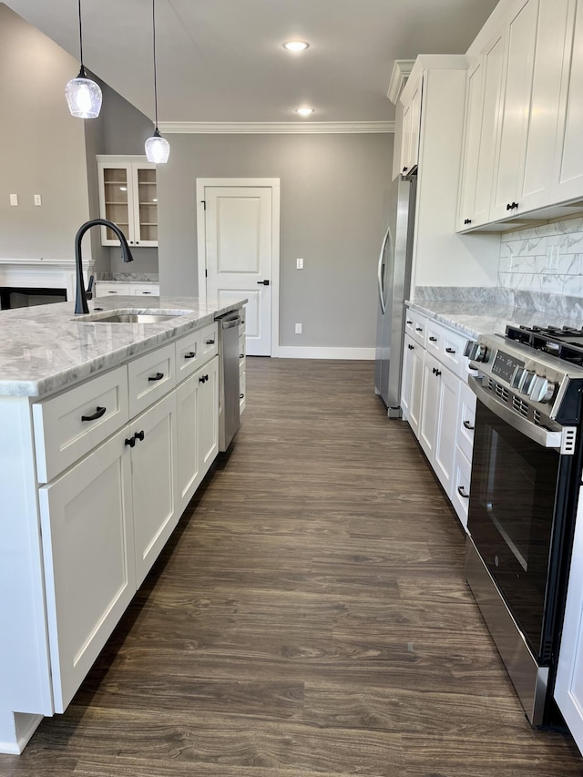 4958 Old State Highway 28, Dunlap, TN 37327 - kitchen featuring stainless steel appliances, a sink, crown molding, white cabinets, and light stone countertops