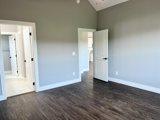 4958 Old State Highway 28, Dunlap, TN 37327 - unfurnished room featuring high vaulted ceiling, dark wood finished floors, baseboards, and a ceiling fan