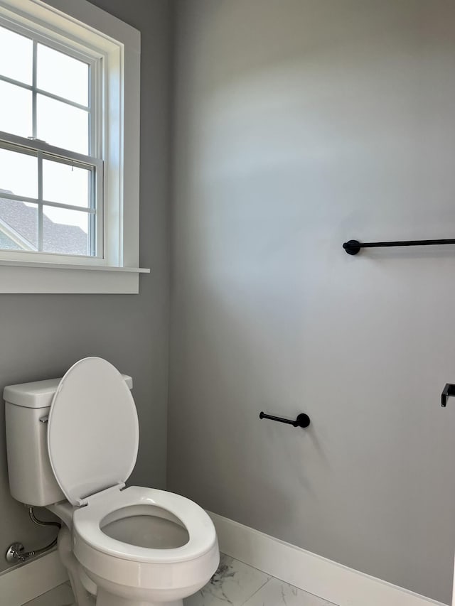 4958 Old State Highway 28, Dunlap, TN 37327 - bathroom with toilet, marble look tiles, and baseboards