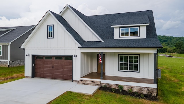 4958 Old State Highway 28, Dunlap, TN 37327 - view of front of house featuring board and batten siding, a porch, a shingled roof, a front lawn, and concrete driveway