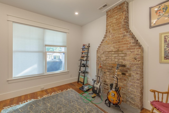 2104 Oak St, Chattanooga, TN 37404 - living area featuring wood finished floors, baseboards, and recessed lighting
