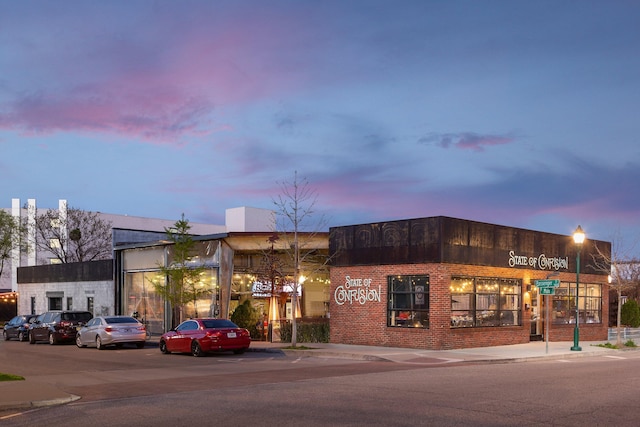 1812 E 13th St, Chattanooga, TN 37404 - property at dusk with uncovered parking