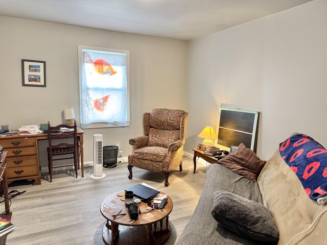 1812 E 13th St, Chattanooga, TN 37404 - living room with wood finished floors and an office area