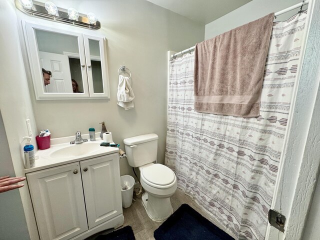 1812 E 13th St, Chattanooga, TN 37404 - bathroom featuring vanity, wood finished floors, and curtained shower