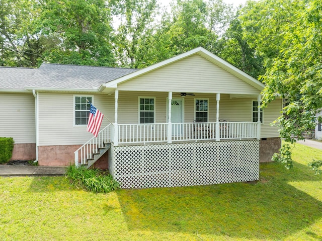 347 Highland Dr, Dunlap, TN 37327 - view of front facade with a porch, a front yard, roof with shingles, crawl space, and ceiling fan