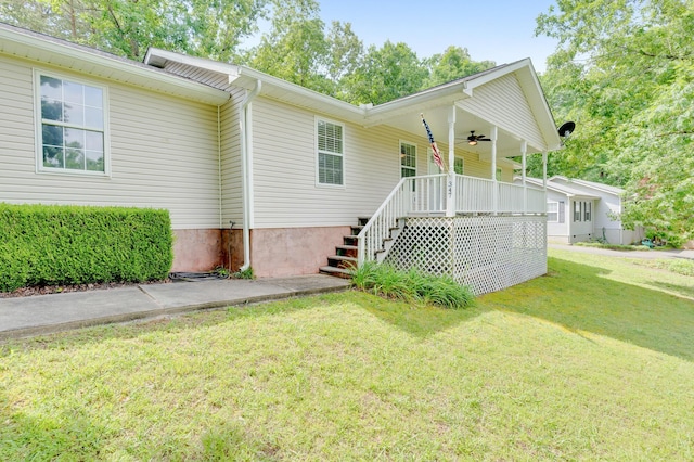 347 Highland Dr, Dunlap, TN 37327 - view of front facade with a ceiling fan, a front lawn, covered porch, and stairway
