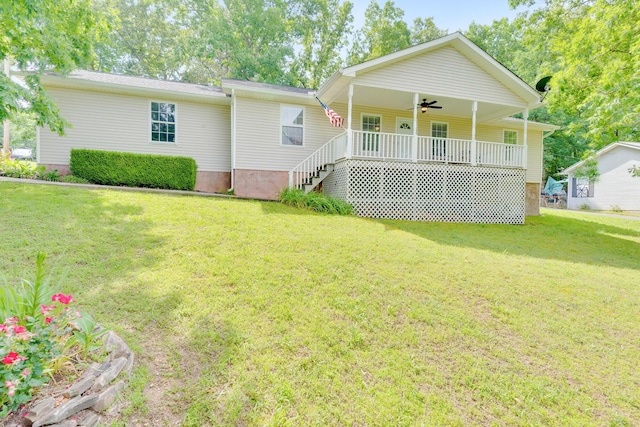 347 Highland Dr, Dunlap, TN 37327 - rear view of house featuring ceiling fan, a lawn, covered porch, and stairs
