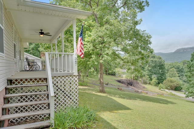 347 Highland Dr, Dunlap, TN 37327 - view of grassy yard with ceiling fan and a deck with mountain view