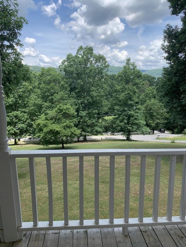 347 Highland Dr, Dunlap, TN 37327 - view of green lawn with a wooden deck