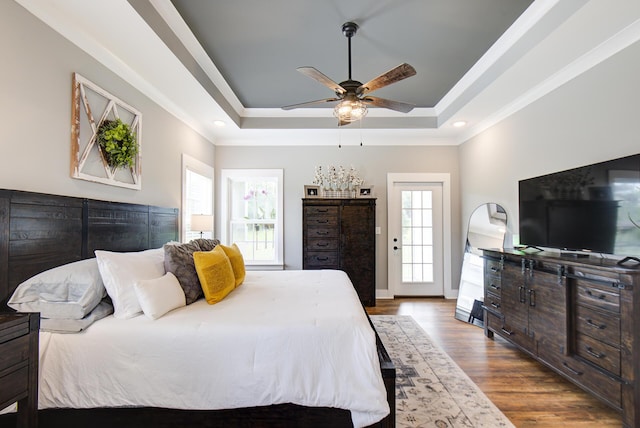 9117 Sir Hudson Ct, Harrison, TN 37341 - bedroom with a raised ceiling, wood finished floors, ornamental molding, baseboards, and ceiling fan