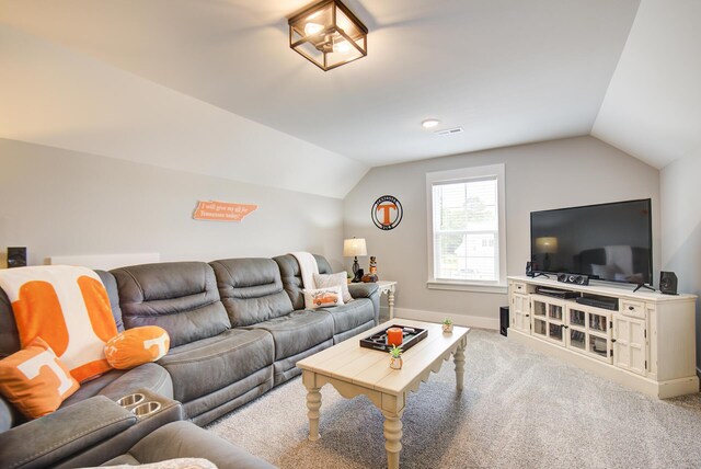9117 Sir Hudson Ct, Harrison, TN 37341 - living area with lofted ceiling, baseboards, and carpet floors