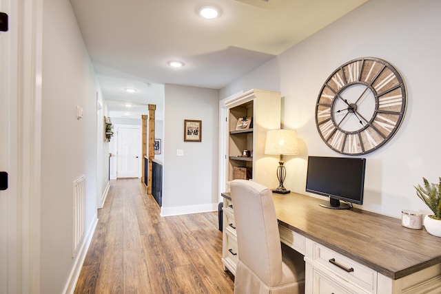 9117 Sir Hudson Ct, Harrison, TN 37341 - office space with wood finished floors, built in desk, recessed lighting, and baseboards